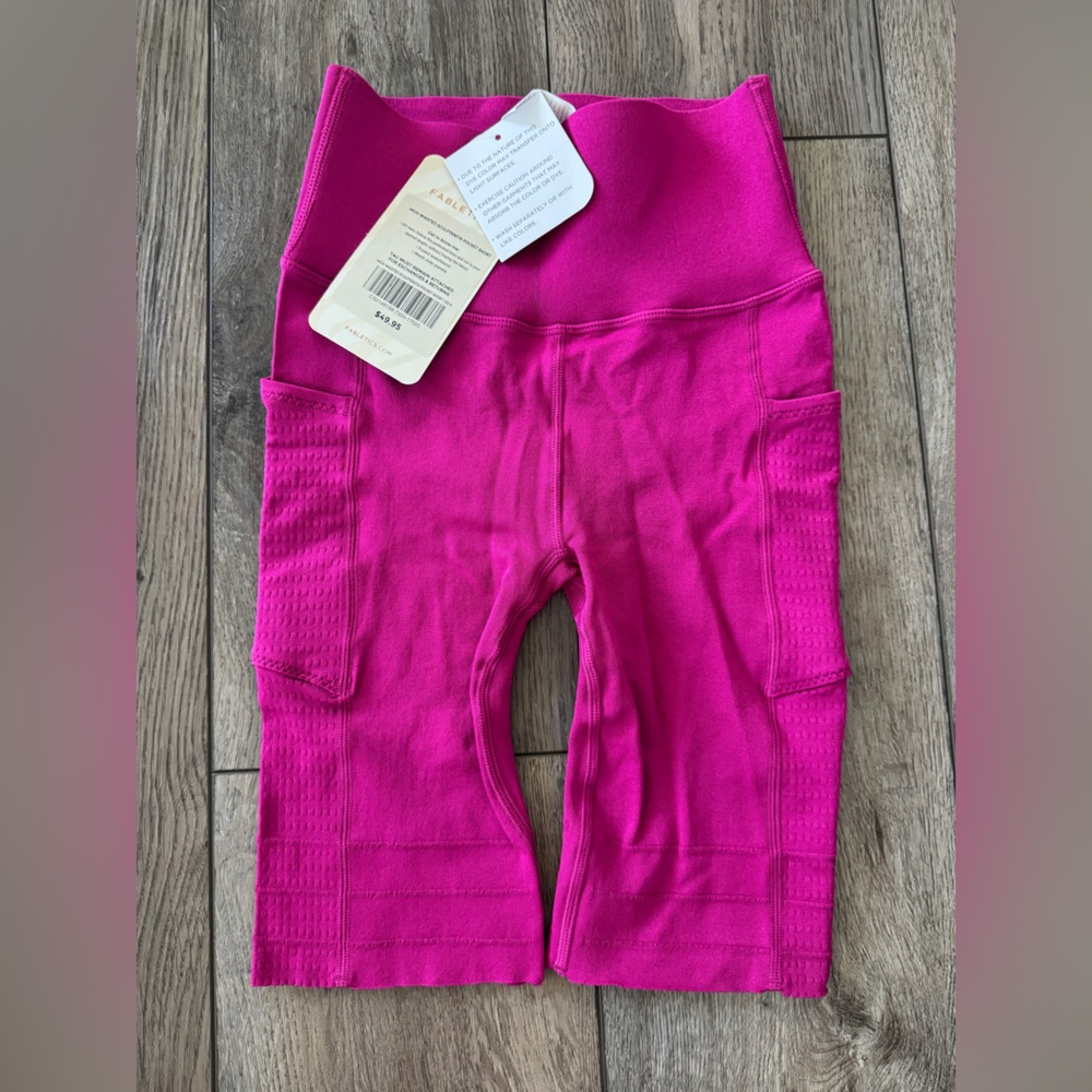 Fabletics High-Waisted SculptKnit Pocket Shorts, Very Berry